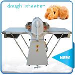 Reversible bakery machinery dough sheeter